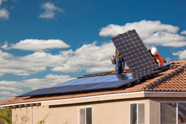 workers-installing-solar-panels-on-house-roof-2022-10-17-01-16-16-utc-768x512-1